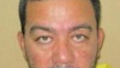 Face photo of male fugitive Luis Alberto Rodriguez