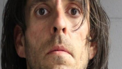 Face photo of male fugitive Jonah Sebastian Couturier